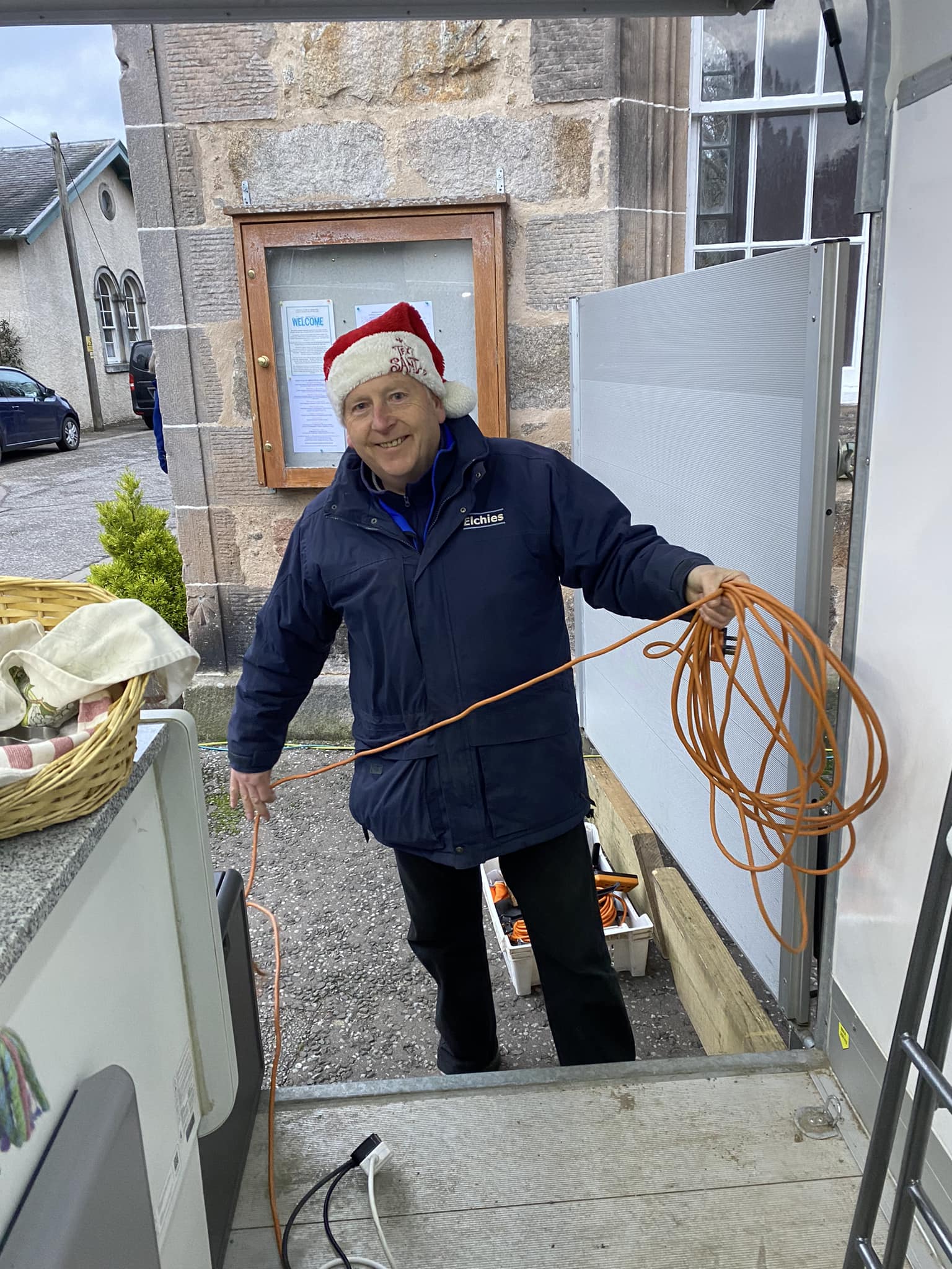Brian wearing a Santa hat.