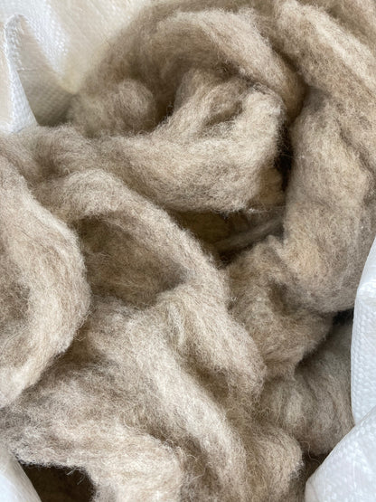 Close-up of Elchies Farm felted wool in the colour 'Light Grey'.