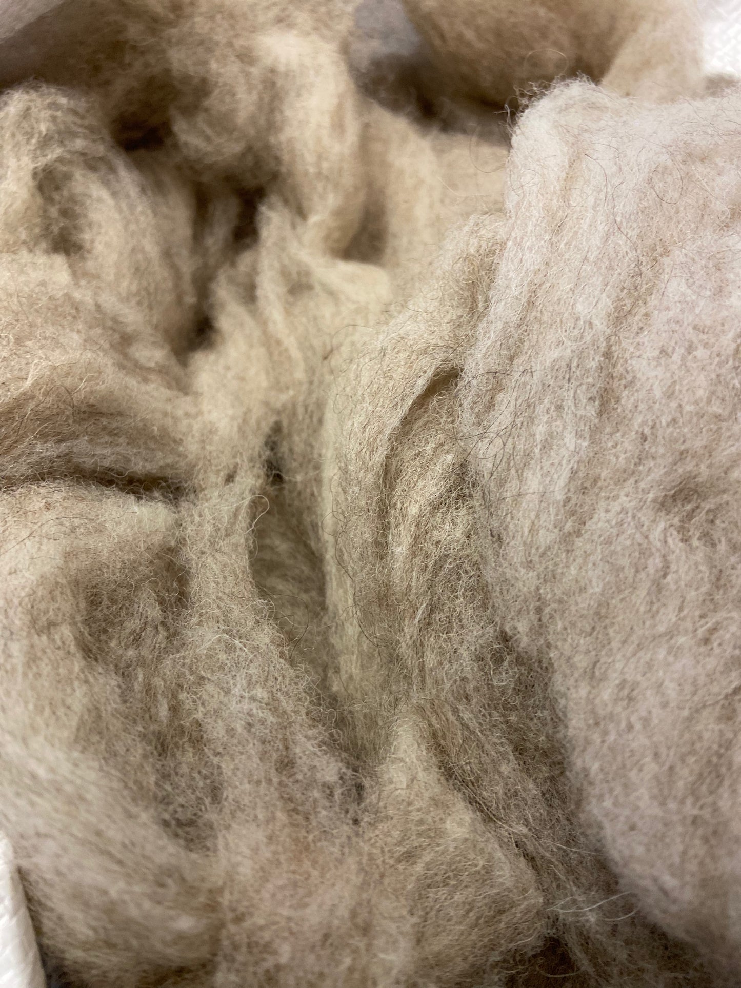 Close-up of Elchies Farm felted wool in the colour 'Steel Grey'.