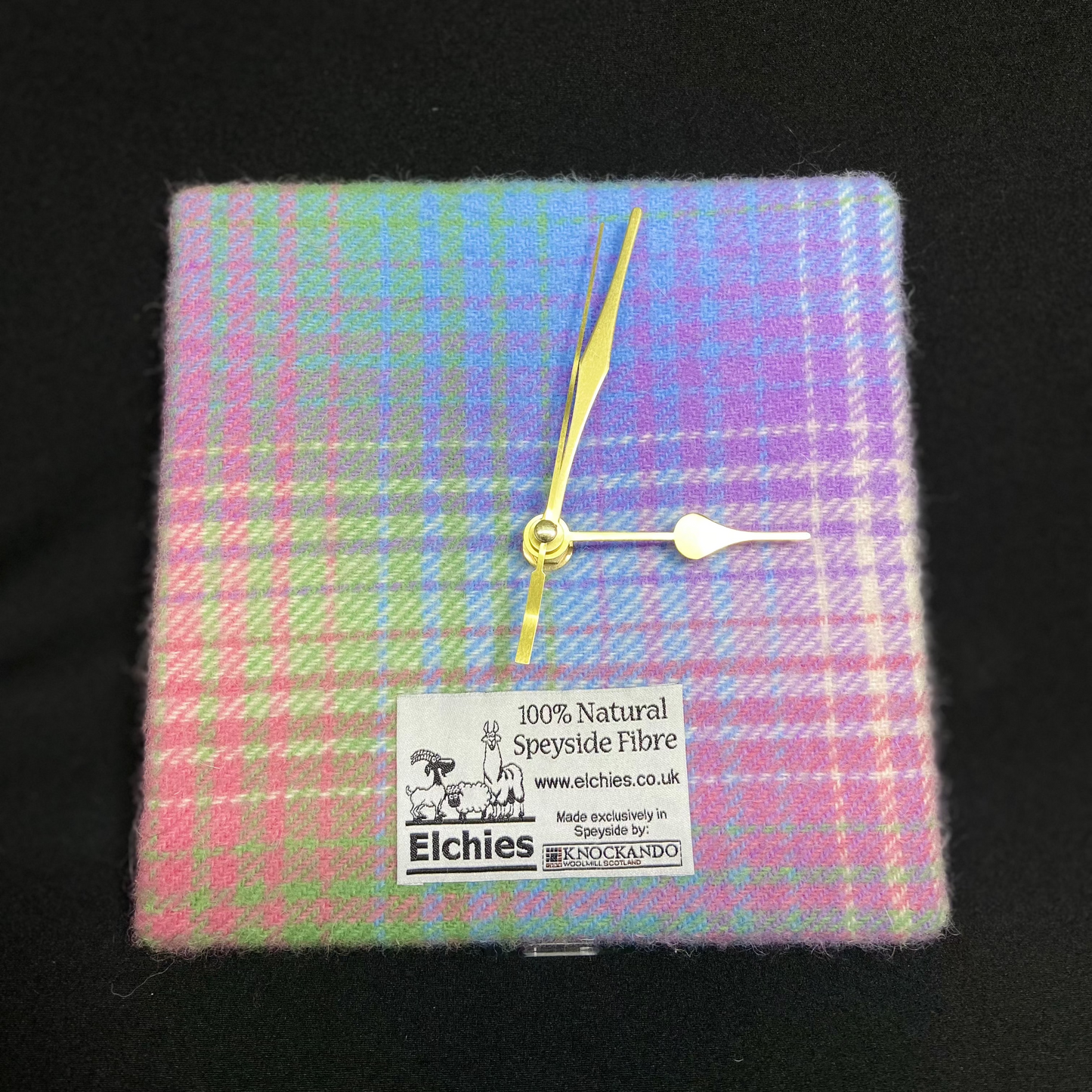 A close-up of the square Elchies Farm 'Borealis Wool Clock'.